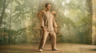 Double exposure of a practitioner doing neck circles blended with sage green morning mist